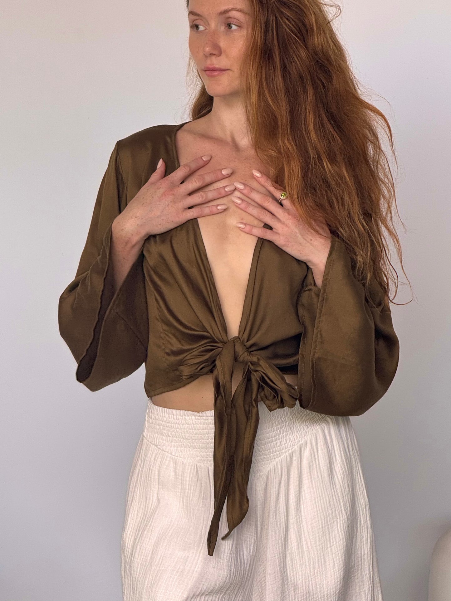 The Oracle Wrap Top